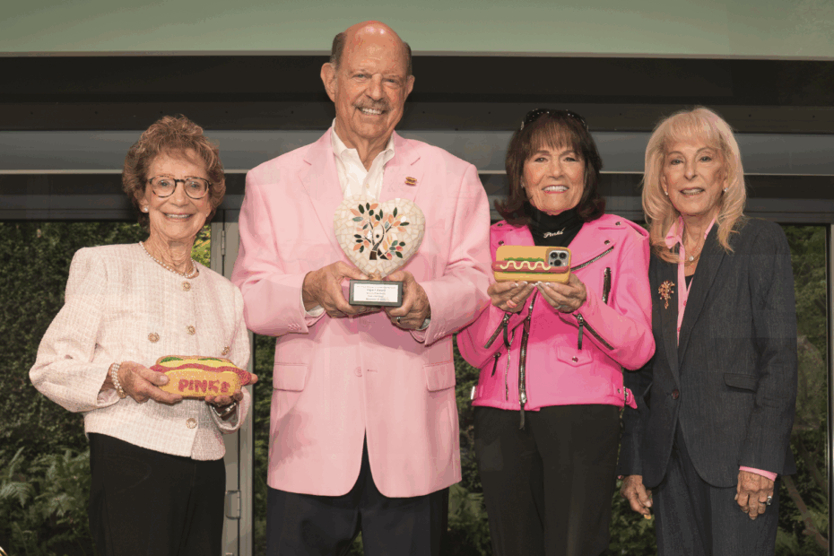 Beverly Pink-Wolfe Richard Pink and Gloria Pink holding awards